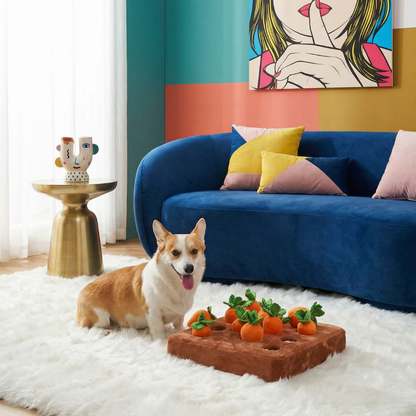 Corgi dog with a brown plush carrot farm snuffle mat toy featuring six removable orange carrots.