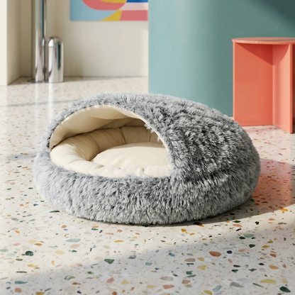 Gray faux fur Cozy Shell Cave Pet Bed with a cream interior, designed as a soft, enclosed hideaway.