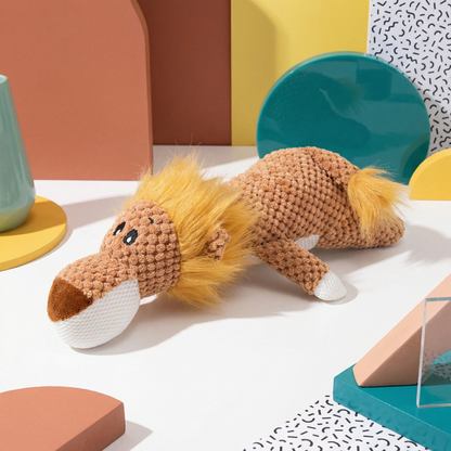 Brown plush lion dog chew toy with a shaggy mane and white paws, on a colorful background.
